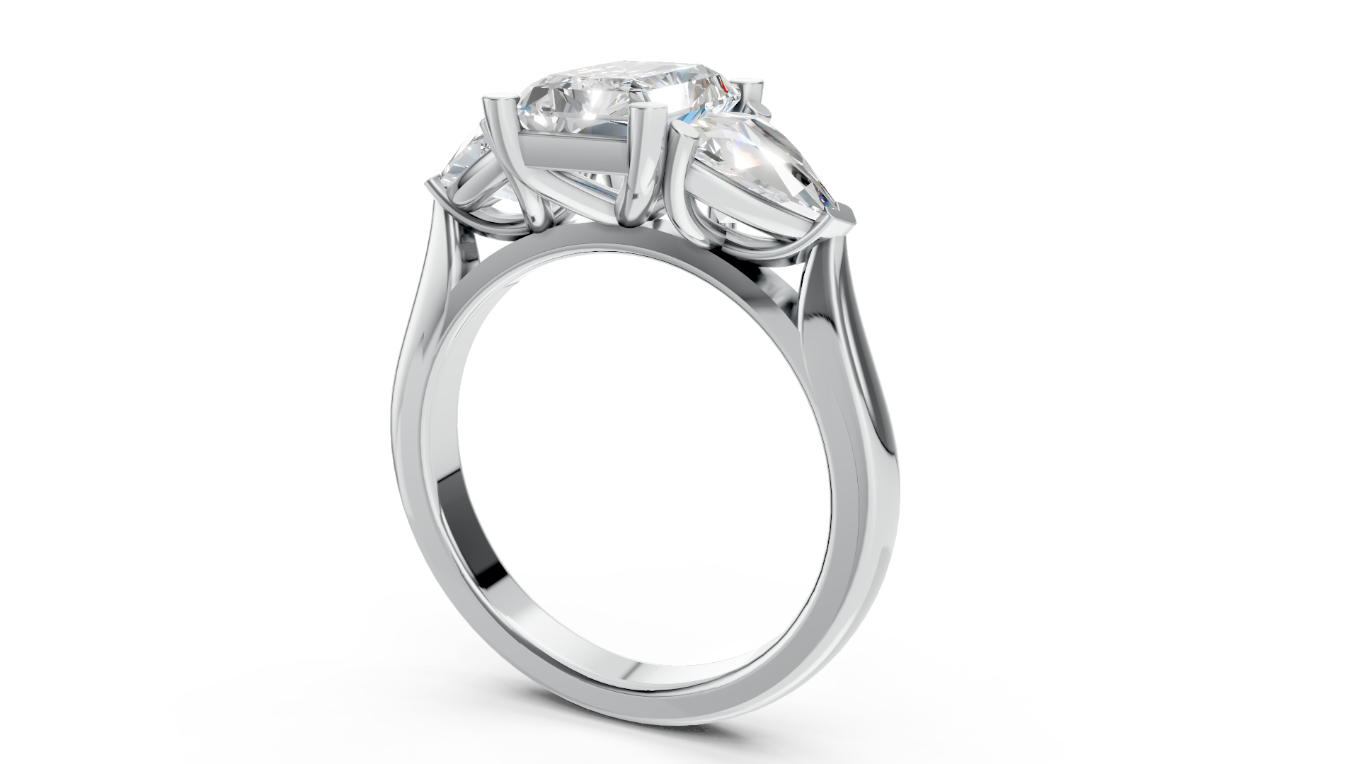Exquisite Platinum Three-Stone Ring with Radiant and Pear Diamonds